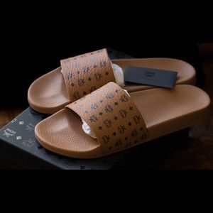 women's monogram print rubber slides